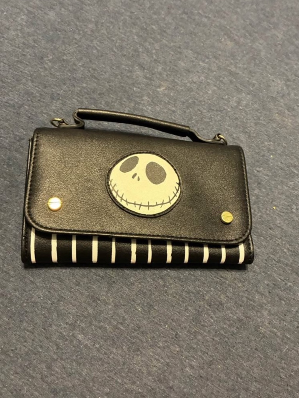 Black Purse with Jack Skellington Face and Striped Trim